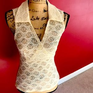 Ladies cream colored v neck lacy tight fitting top
